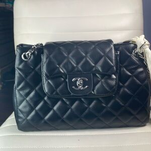 Black Chanel lamb skin bag